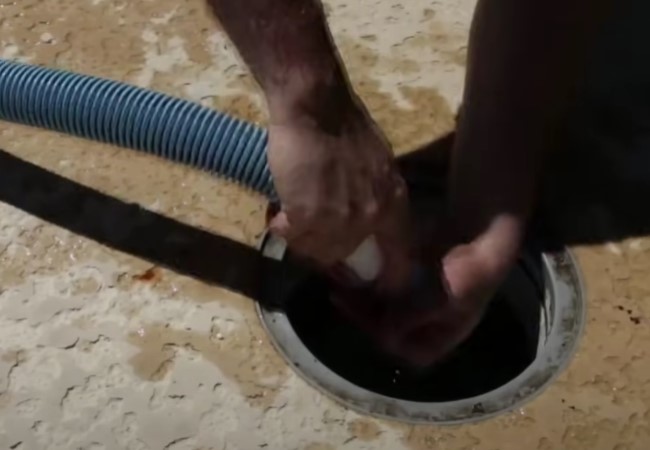 Connecting the vacuum hose to the pool skimmer to get proper suction